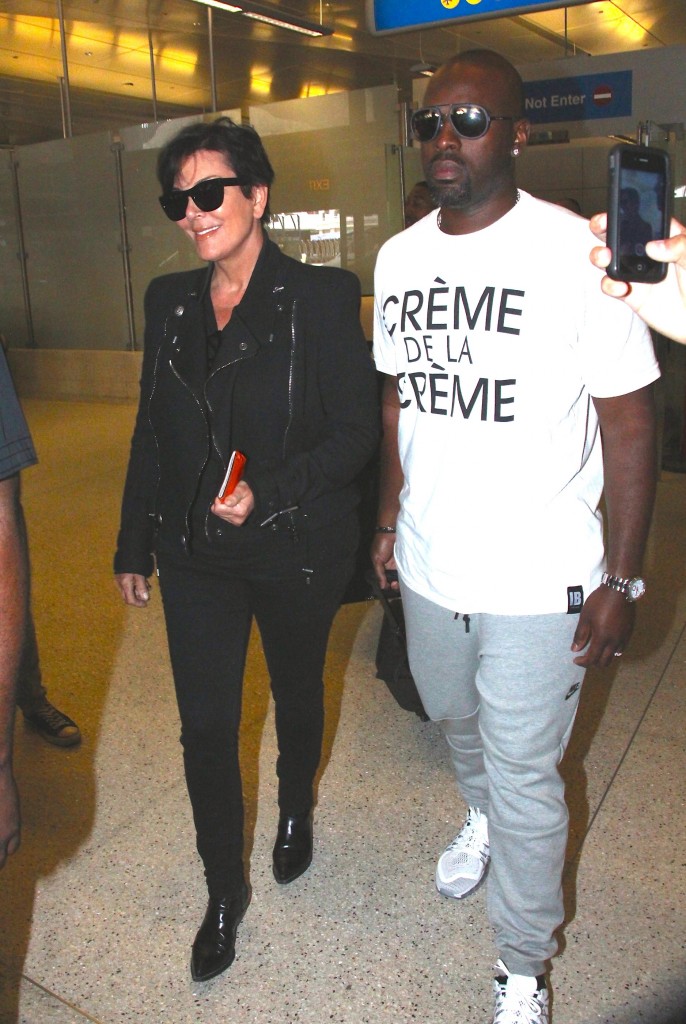 Kris Jenner arrives back at LAX with Corey Gamble. (Photo: VLUV / DutchLabUSA / Splash)