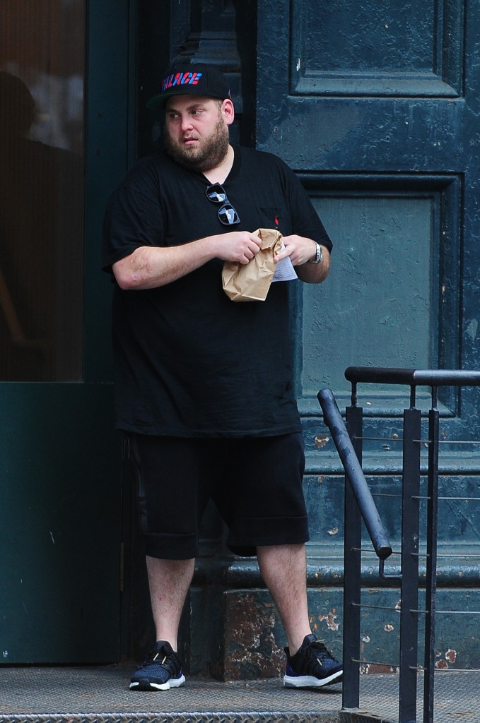 Jonah Hill gets a food delivery in NYC