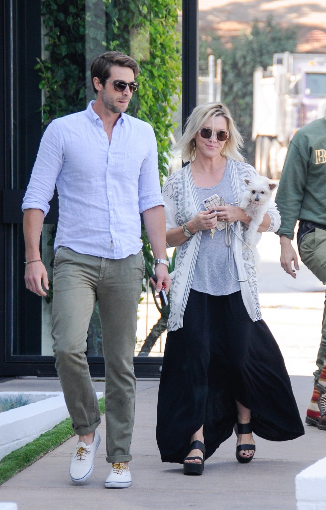 **USA ONLY** West Hollywood, CA - Actress Jennie Garth, who recently got engaged to actor David Abrams after a whirlwind courtship, enjoys a beautiful sunny day in West Hollywood with her handsome fiancee. The two, along with Jennie's adorable puppy, went for a bit of retail therapy and paid a visit to John Varvatos in West Hollywood.   AKM-GSI  May  29, 2015 **USA ONLY**  **MANDATORY CREDIT MUST READ: The Grosby Group/AKM-GSI** To License These Photos, Please Contact : Steve Ginsburg (310) 505-8447 (323) 423-9397 steve@akmgsi.com sales@akmgsi.com or Maria Buda (917) 242-1505 mbuda@akmgsi.com ginsburgspalyinc@gmail.com